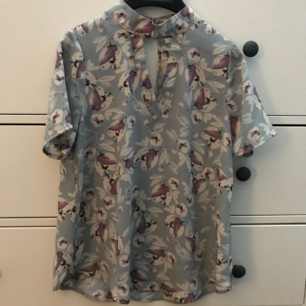 Floral top with opening in front and back